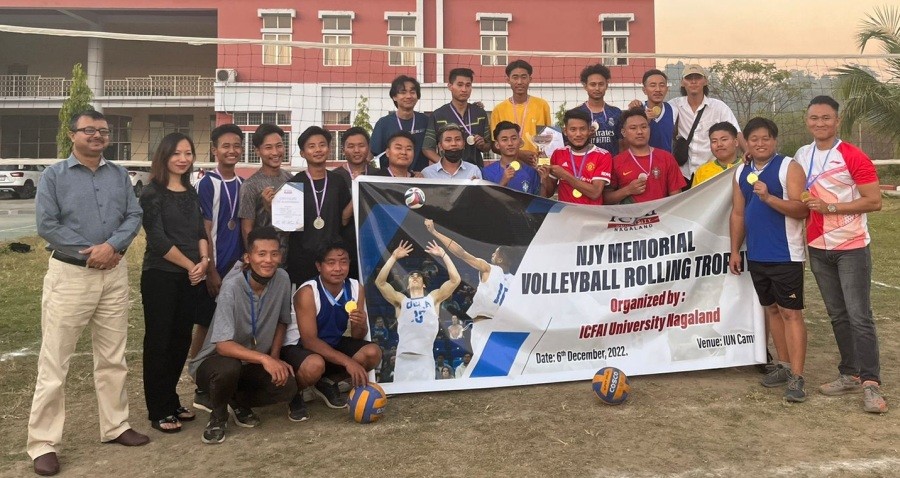 Players of the School of Social Sciences, the winner of the annual ICFAI University Nagaland’s NJY Memorial Volleyball Rolling Trophy 2022 on December 6, 2022 at the university campus. (Photo Courtesy: ICFAI)
